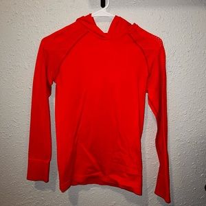 Athletic top with mesh like opening on top
